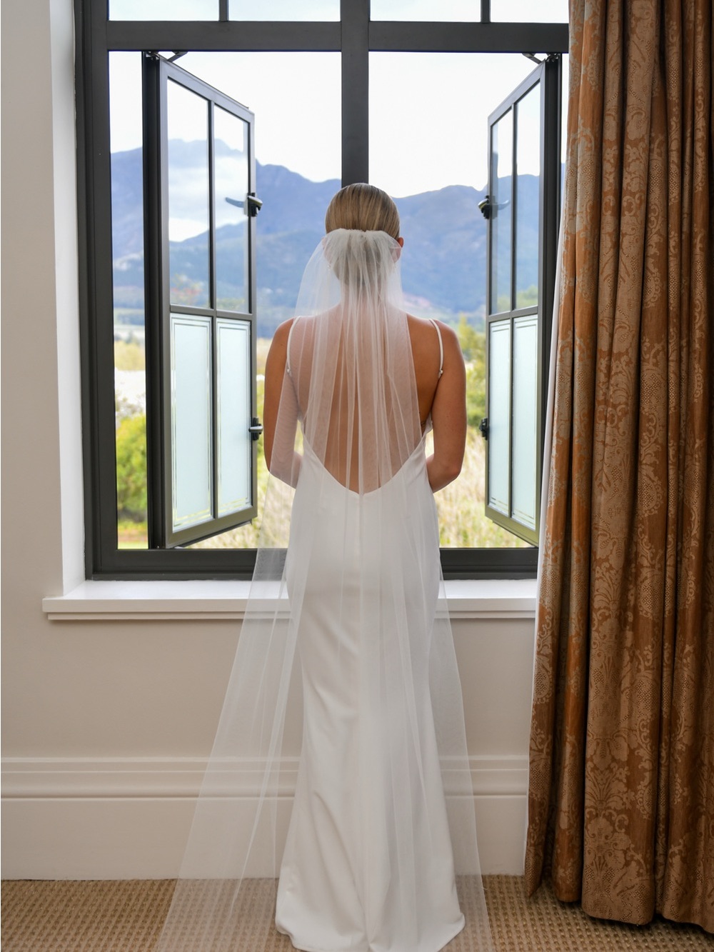 REVOLVE White Minimalist Backless Wedding Gown